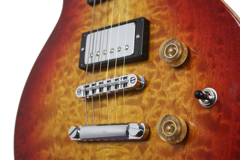 Tunamatic bridge with stop tailpiece